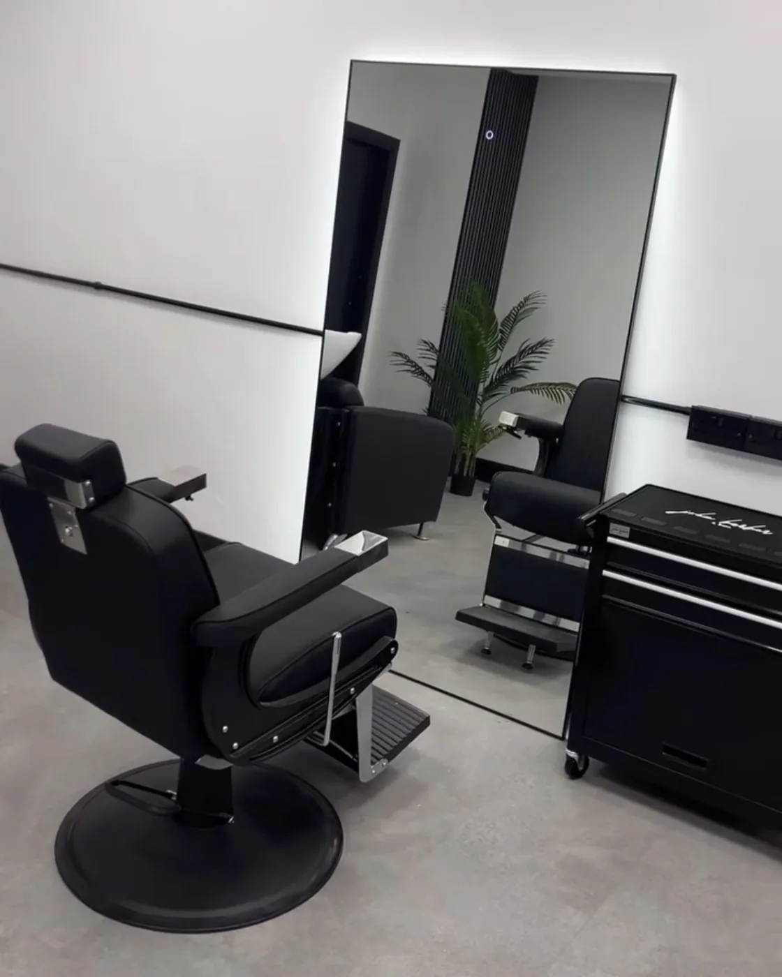 Studio Eleven interior, all chairs busy, team at work